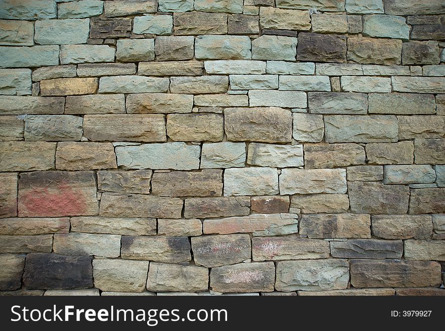 Wall texture of old farm wall made of local stones