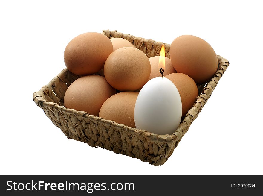 Few Eggs In A Basket With A Candle