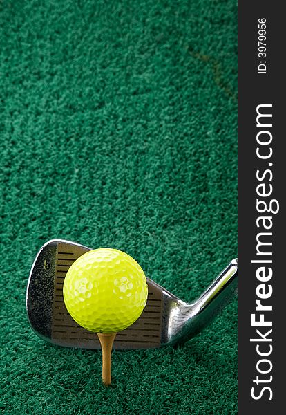 Golf Ball And Five Iron