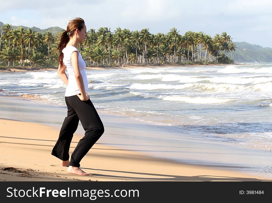 Yoga and fitness exercises on the beach