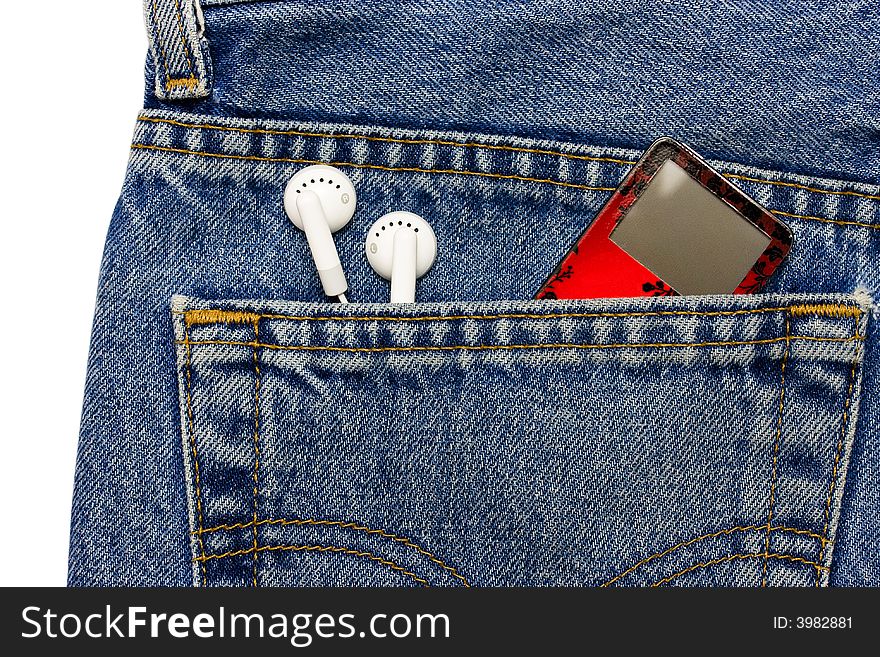 MP3 player in jeans pocket with headphones. MP3 player in jeans pocket with headphones