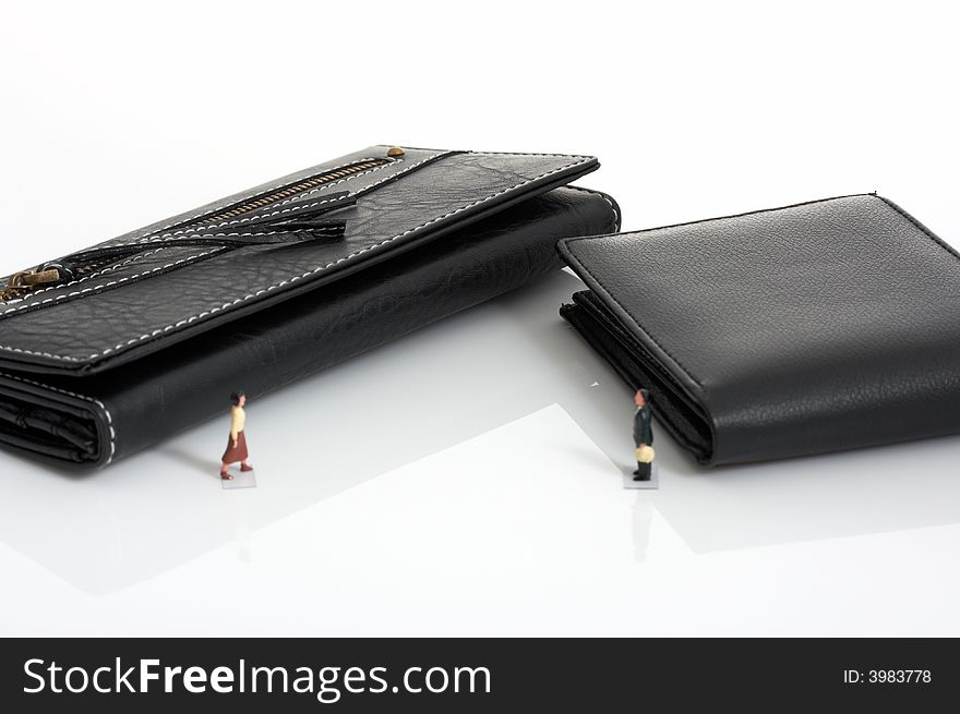 A black leather purse and a black leather wallet. A black leather purse and a black leather wallet