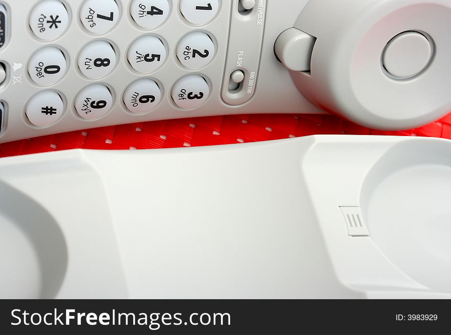 Photo of a telephone over a red background
