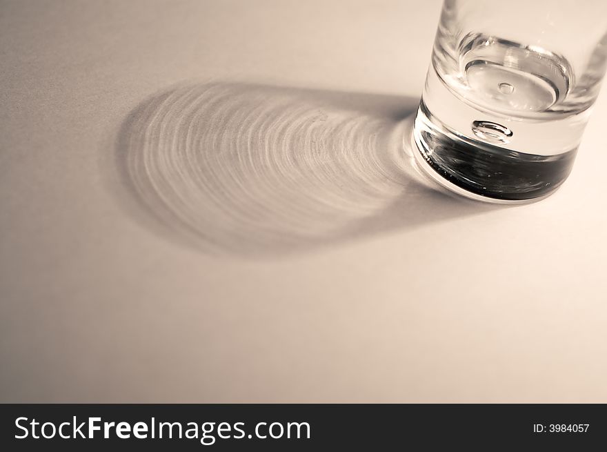 Vodka glass on a white background