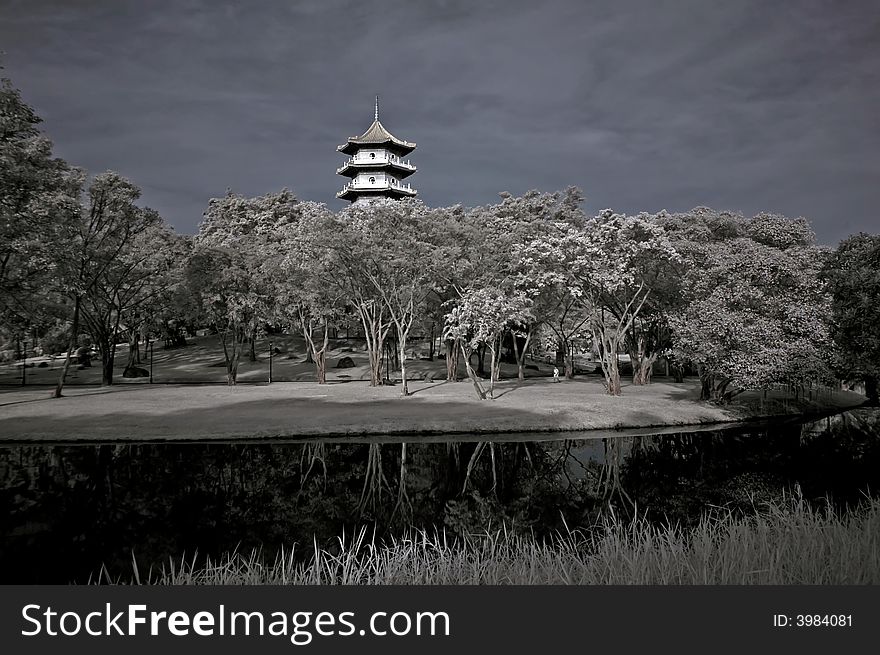 Infrared photo â€“ tree, pagoda and lake in the parks