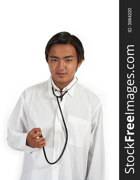 A doctor holding a stethoscope over a white background. A doctor holding a stethoscope over a white background