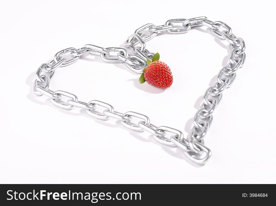 Chain combined in the form of heart with a strawberry. Chain combined in the form of heart with a strawberry