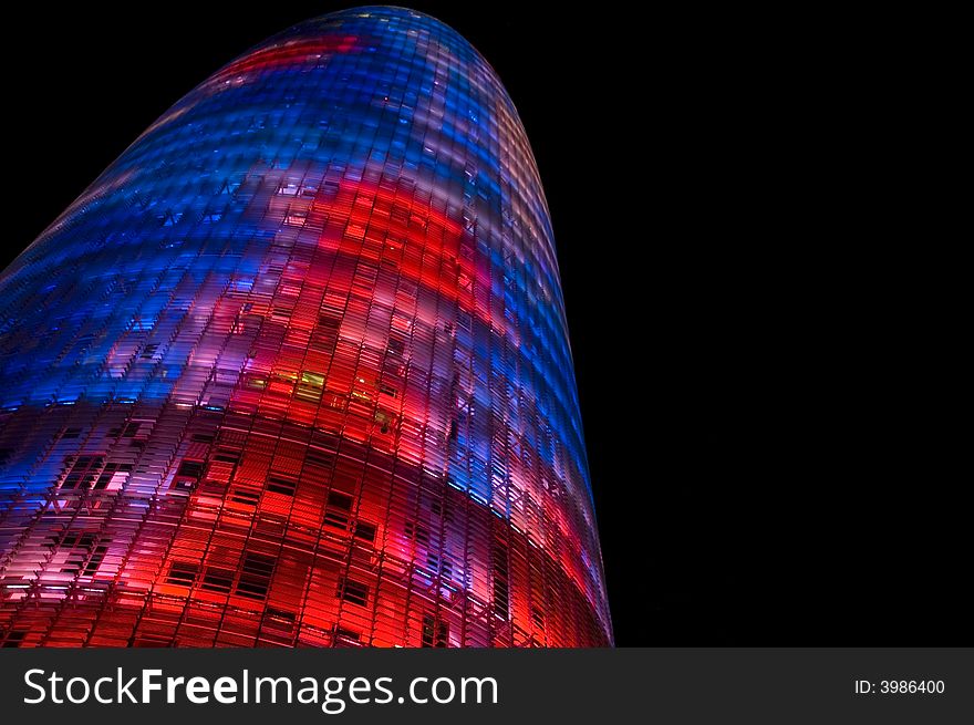 Colorfull skyscraper made of glass during the night