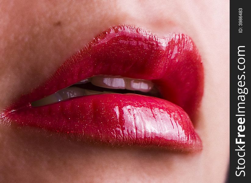 Close up shot of red lips with lipstick