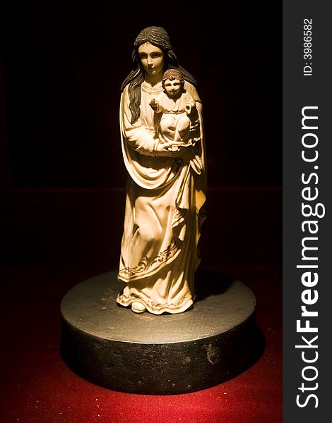 A small statue of maddona and child. A small statue of maddona and child