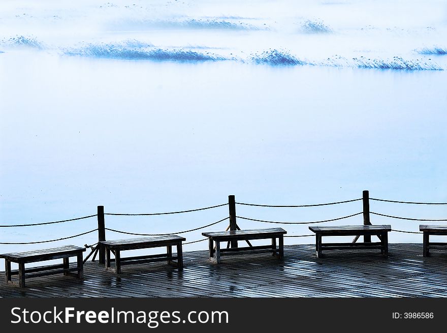 Chairs On The Lake Shore