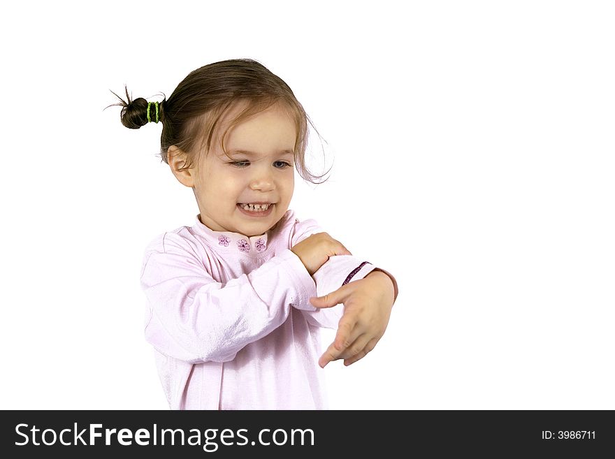 Little girl dancing on the white background