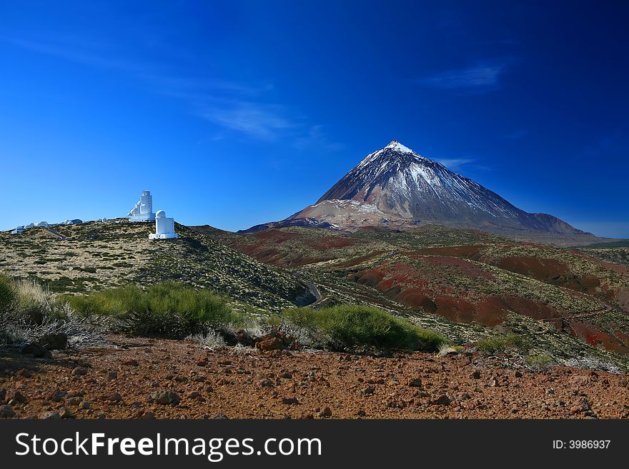 An image of mount Teide and the observation center with a clear blue sky. An image of mount Teide and the observation center with a clear blue sky.