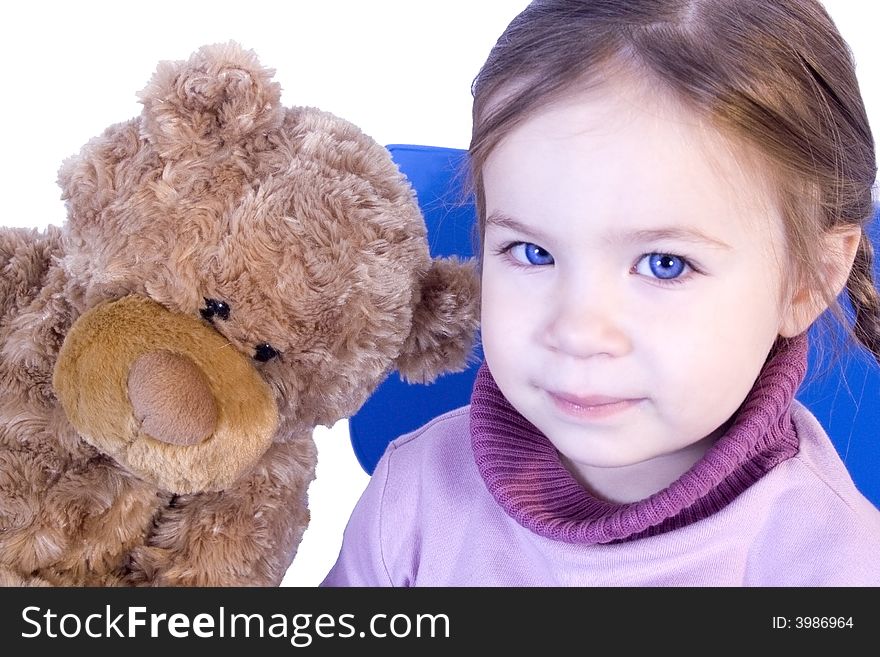 A Sweet Baby Girl With Her Teddy Bear