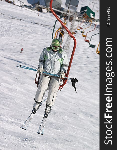 Skier on chair lift