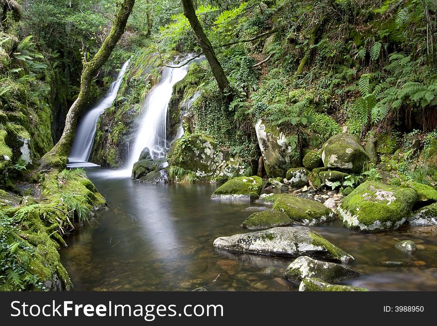 The beautiful waterfall in forest, spring, long exposure