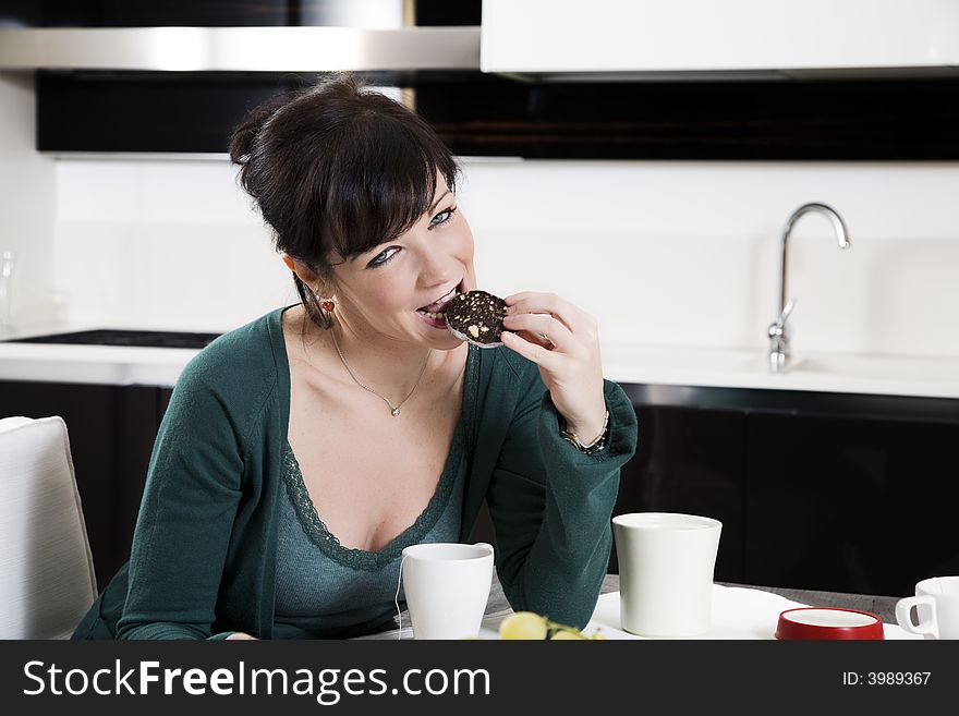 Home life: woman eating a piece of cake