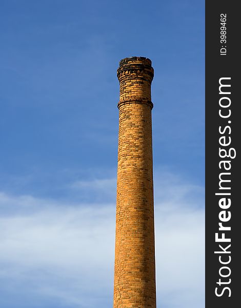 Old factory chimney made of bricks