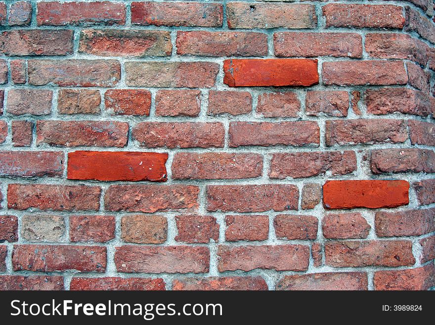 Old wall with orange bricks