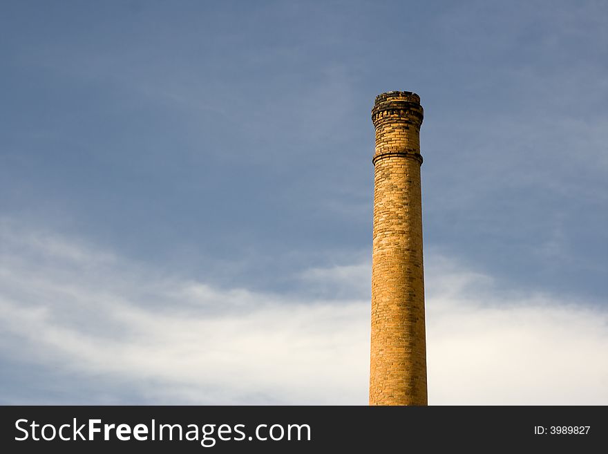 Old factory chimney made of bricks