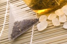 White Tea, Nylon Tea-bag And Sugar Stock Photo White Tea, Nylon Tea-bag And Sugar Stock Photo