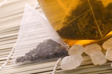 White Tea, Nylon Tea-bag And Sugar Royalty Free Stock Image White Tea, Nylon Tea-bag And Sugar Royalty Free Stock Image