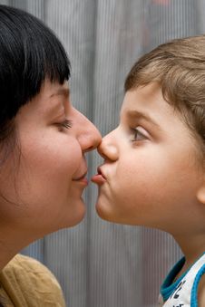 Mum And The Son Kiss Royalty Free Stock Images
