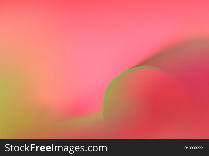Pink and green abstract of a piece of a drinking straw taken at appx 3x life size. Pink and green abstract of a piece of a drinking straw taken at appx 3x life size.