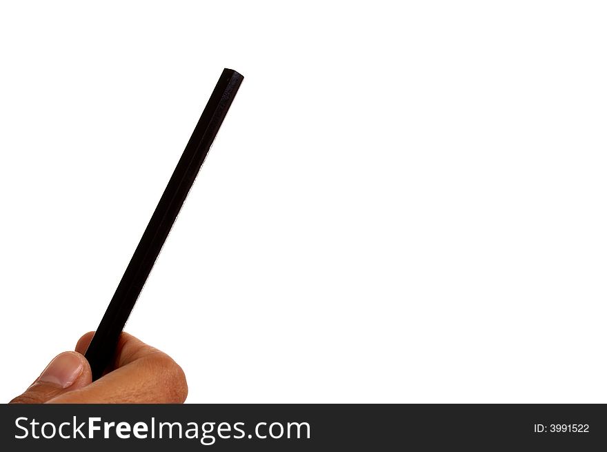 Hand holding a black pencil in whitebackground