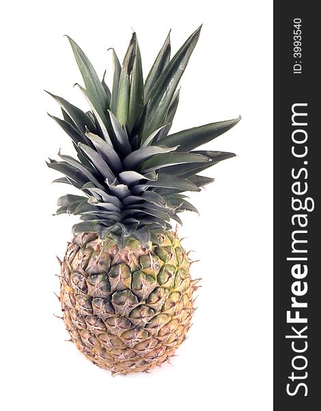 Large full pineapple isolated on white background