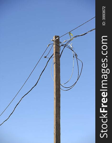 A power pole with wires