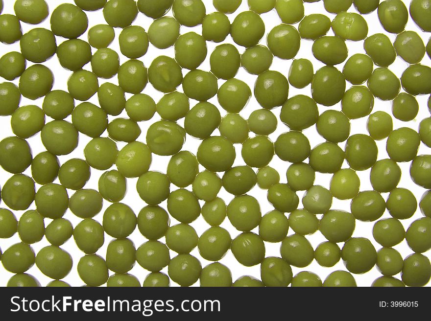Fresh green peas, abstract background