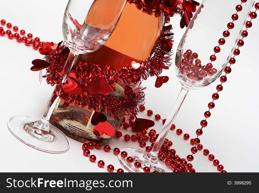 Valentine champagne and two glasses on white background. Valentine champagne and two glasses on white background.