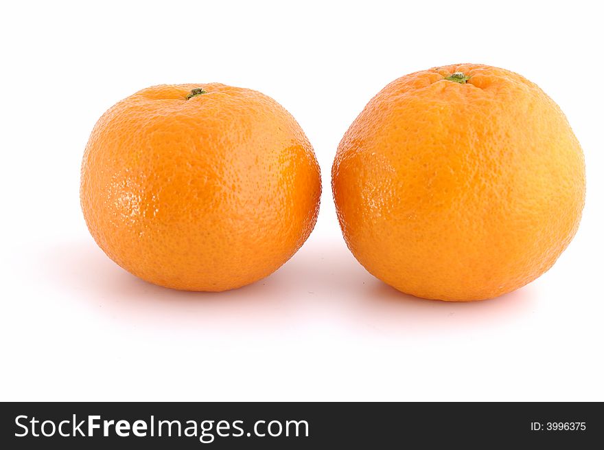 Two tangerine isolated in background white