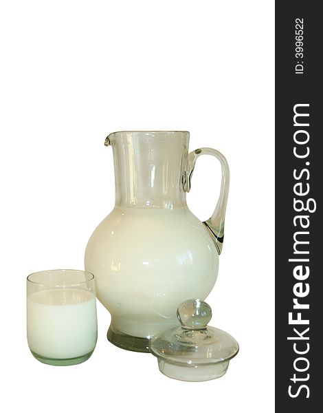 Jug filled by milk on a white background