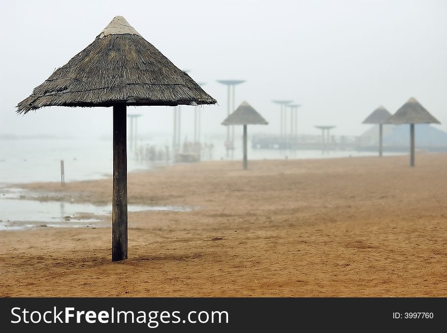 Beach umbrella with light winter rain