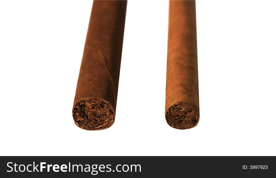 The Cuban cigar it is isolated on a white background. The Cuban cigar it is isolated on a white background