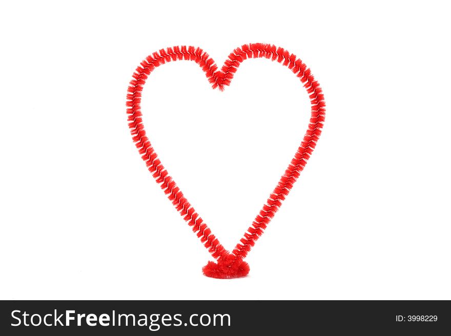 Hand-made red chenille heart isolated on white background for use alone or in composites.