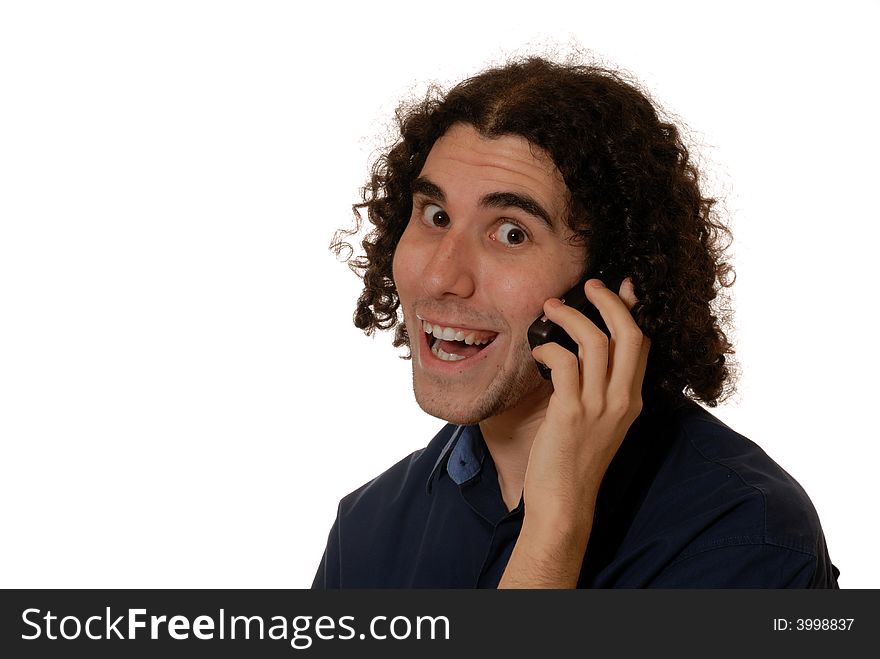 Young man with curly hair and blue shirt on mobile phone, isolated on white. Young man with curly hair and blue shirt on mobile phone, isolated on white