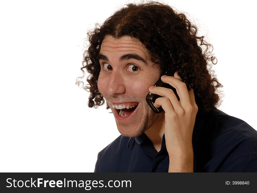 Young man with curly hair and blue shirt on mobile phone, isolated on white. Young man with curly hair and blue shirt on mobile phone, isolated on white