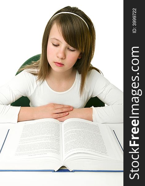 Portrait of Happy young schoolgirl reading book