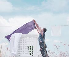 Man With Laundry Background Concept Royalty Free Stock Photography Man With Laundry Background Concept Royalty Free Stock Photography