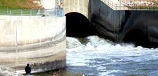 Fishing The Powerful Dam Outlet Royalty Free Stock Photo Fishing The Powerful Dam Outlet Royalty Free Stock Photo