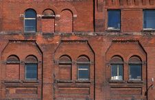 Exterior Of Brick Building With Windows Royalty Free Stock Photo
