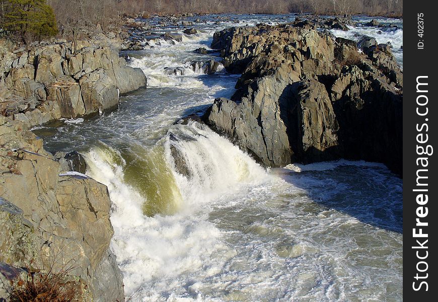Photo of Great Falls on the Potomac river from the Virginia side. Photo taken during wintertime. The waterfall shown here is a favorite drop for kayakers. Photo of Great Falls on the Potomac river from the Virginia side. Photo taken during wintertime. The waterfall shown here is a favorite drop for kayakers.