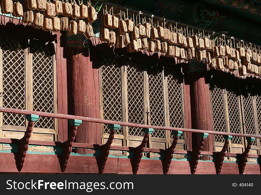 Food hangs at the edge of a Buddhist temple