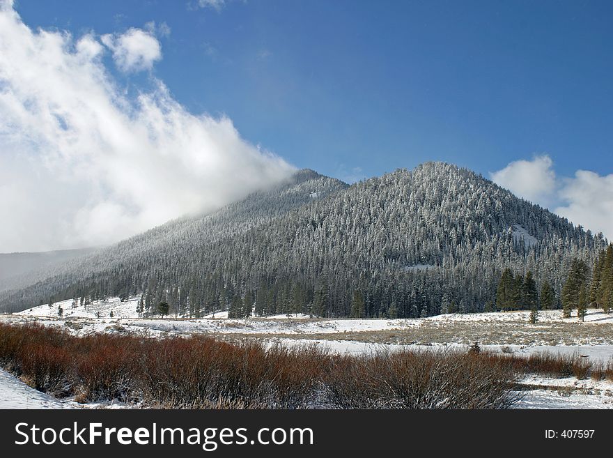 Cloud On Snowy Mountain