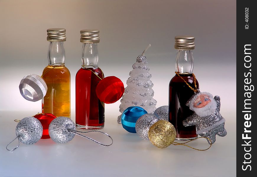 Composition with holidays drinks, balls and Christmas tree