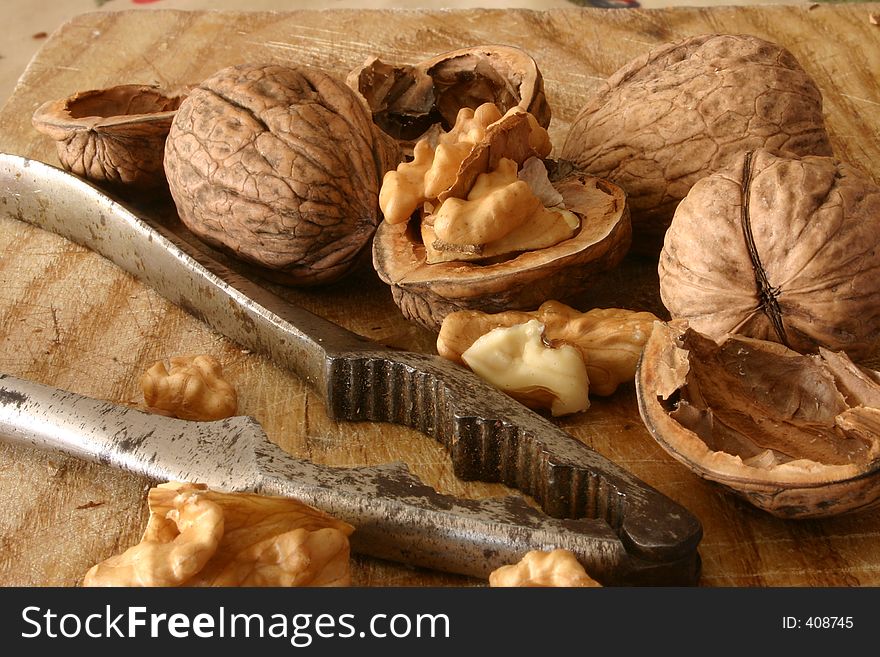 Walnuts and nutcracker close-up