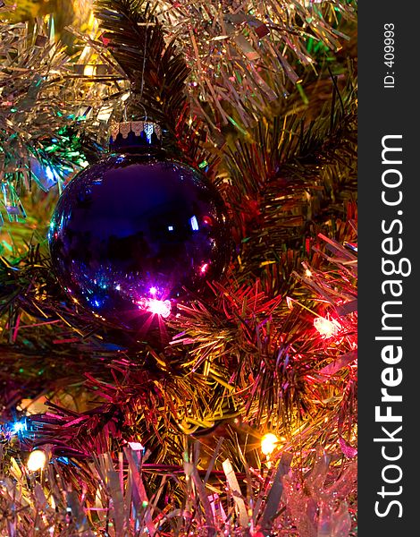 Christmas tree decoration lit with tree lights. Christmas tree decoration lit with tree lights.